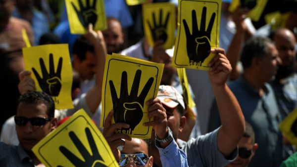 The Egyptian police launched an offensive on the Cairo district of Kerdasah on Thursday in an attempt to arrest Islamist militants suspected of torching police stations and killing security officials. (AFP/File)
