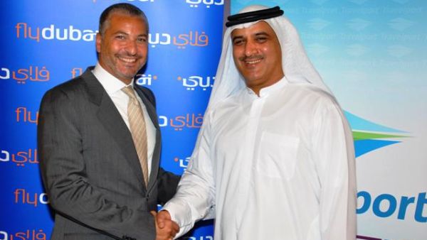 Ghaith Al Ghaith, CEO of flydubai shaking hands with Rabih Saab, President and Managing Director of Travelport at ATM 2011