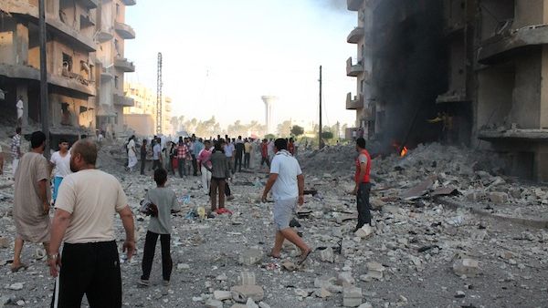 Rubble and debris litter the street following an explosion in the northern Syrian city of Raqqa, early on August 7, 2013. (AFP)