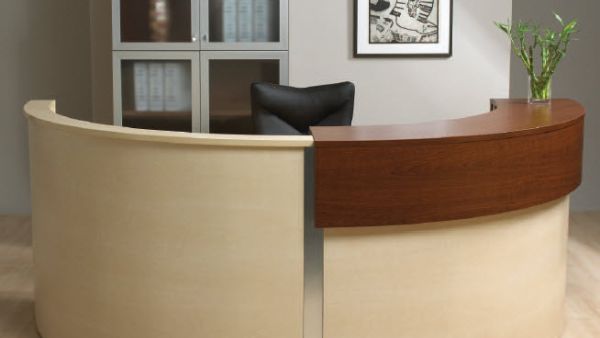 The receptionist was caught off-guard when the offer of coffee turned into an unwanted hug that later resulted in a forceful kiss. (Image courtesy of "officefurnituredepot.com")