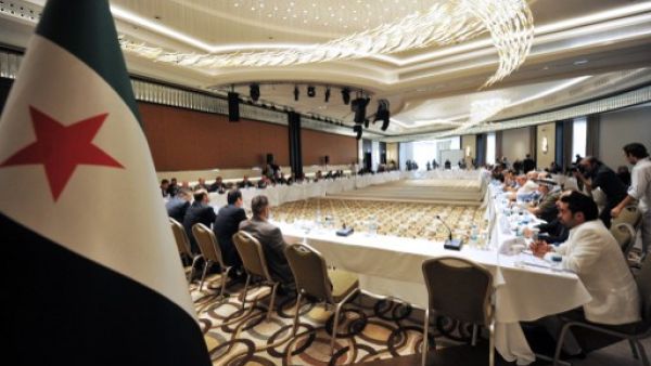 Ahmad Tumeh was elected provisional PM of the SNC on Saturday. Here, members of Syrian National coalition (SNC) attend a meeting of the National Coalition of Syrian Revolution and Opposition forces on September 13, 2013, in Istanbul. (AFP)