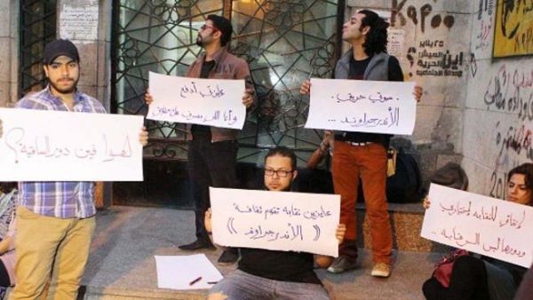 Protesters in front of the Sawy Culturewheel.