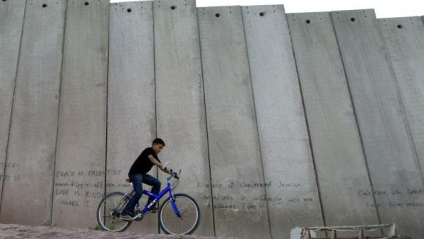 The conservative Likud party, which Prime Minister Benjamin Netanyahu heads, ensured that the "left wing" "Two-State Solution" bill was not passed in the Knesset. Opposition MPs warned that Israel will become isolated if it does not reach peace with Palestine soon. (AFP/File)