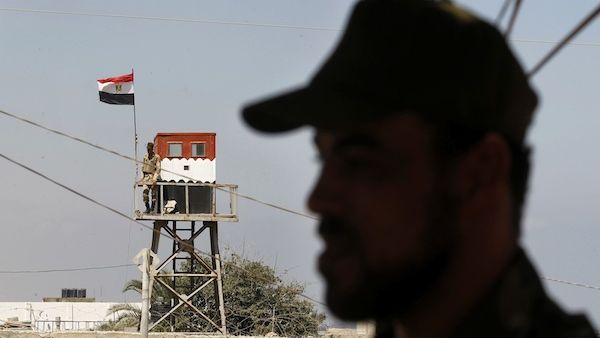 RAFAH : A Hamas policeman (R) stands in Rafah in the southern Gaza Strip on the border with Egypt, on July 5 (Source: AFP / SAID KHATIB)