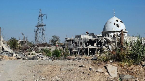 A handout picture from the Syrian opposition shows a mosque damaged in shelling by Syrian government forces in the Damascus suburb of Jobar in early August. (AFP/Shams News Network) A handout picture from the Syrian opposition shows a mosque damaged in shelling by Syrian government forces in the Damascus suburb of Jobar in early August. (AFP/Shams News Network)
