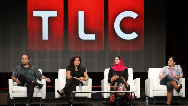 Cast members on a panel hosted by TLC. 