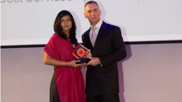 Seema Pande, Area Director of Sales & Marketing, receiving the award on behalf of The Address
