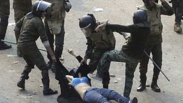 The image seen around the world of the Egyptian exposed woman. (Image courtesy of "thealantic.com")