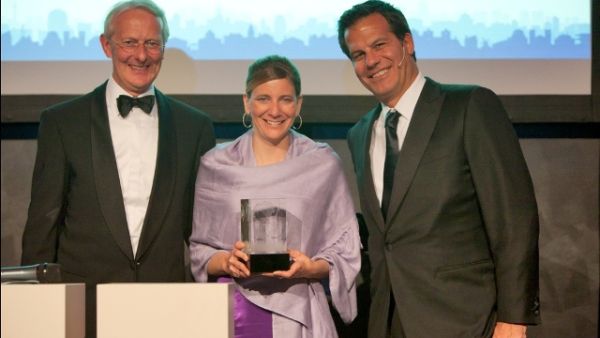 Winner of the award, Sabrina Faber, holding her trophy