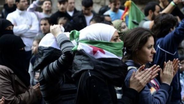 Female protestors in Aleppo, Syria (AFP)