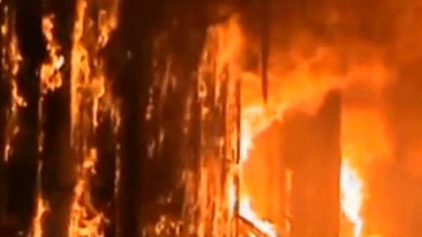 The historical souk in Aleppo burns and the people are in disbelief.