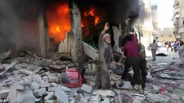 Government warplanes launched airstrikes throughout Aleppo Tuesday (AP)