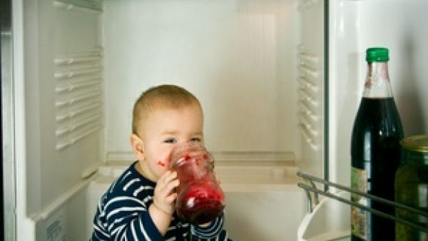 More than milk and veg in this dark fridge:  the teen Turkish mother reportedly hid the dead baby's body in her dorm refrigerator (Image used for illustrative purposes: kid in fridge/ Shutterstock)