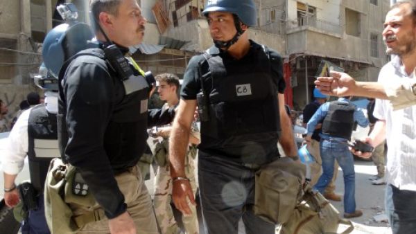 This photo taken on August 28, 2013, in the Eastern Ghouta area on the northeastern outskirts of Damascus, shows United Nations (UN) arms experts arriving to inspect a site suspected of being hit by a deadly chemical weapons attack the previous week. (AFP) This photo taken on August 28, 2013, in the Eastern Ghouta area on the northeastern outskirts of Damascus, shows United Nations (UN) arms experts arriving to inspect a site suspected of being hit by a deadly chemical weapons attack the previous week. (AFP)