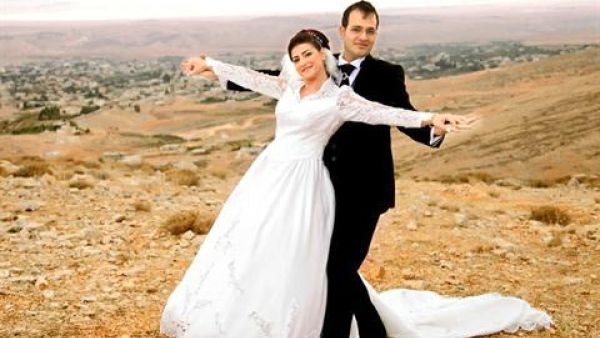 Kholoud Succariyeh's family say they disapprove of her her attempts to wed in civil ceremony.