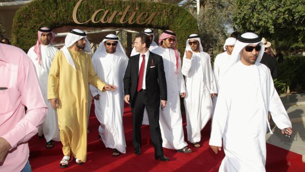 Dubai is home to horse-racing competitions, tennis championships and, here shown, Cartier International Dubai Polo Challenge at the Desert Palm Hotel. Expats who can afford the lifestyle can pursue activities
 associated in some societies at least with rich and 'classy' living.
