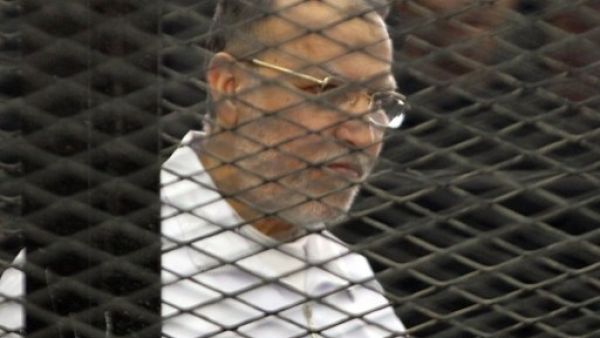 Mohammed Badie along with 34 co-defendants, such as Essam Al Eryan, are on trial for protest killings and inciting violence during the June 30 demonstrations (Maher Iskander/AFP) Mohammed Badie along with 34 co-defendants, such as Essam Al Eryan, are on trial for protest killings and inciting violence during the June 30 demonstrations (Maher Iskander/AFP)