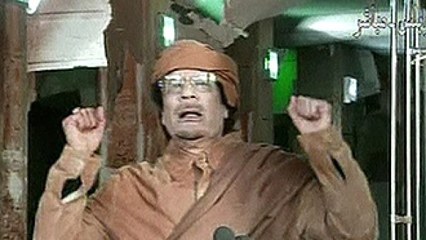 A defiant Col Muammar Gaddafi evaded capture for the first weekend as a reward of two million Libyan dinars offered for the fugitive Libyan leader, dead or alive.