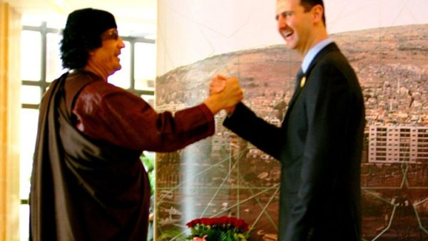 Gaddafi and Assad: an 'unholy' alliance of leaders tottering on brink of abyss of ousting.