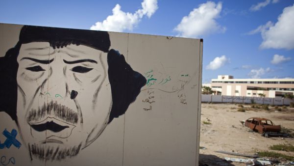 Gaddafi lives on in mocking graffiti images.
