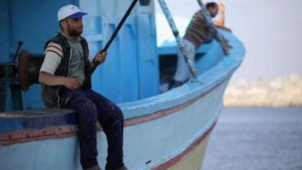 Gaza fishermen test their new freedom after the ceasefire allows them to set sail up to six miles from shore. (Christopher Furlong/Getty Images)