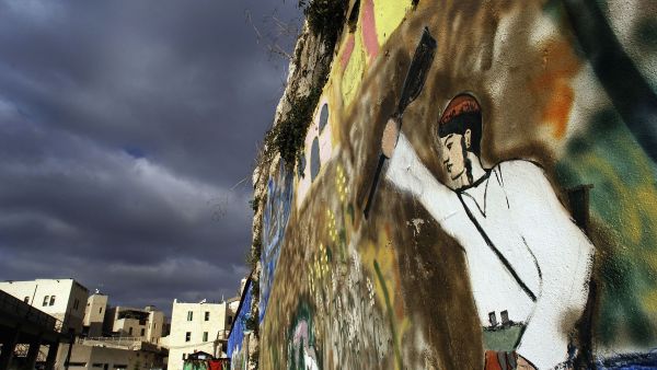 Israeli graffiti with messages as pointed as 'kill All Arabs' can be found by Israelis behind a campaign to maintain acts
of hatred targeting Palestinians. "The King’s Doctrine," is a book written by an unknown settler rabbi,  replete with justifications
from scripture for killing any innocent gentiles during religious war.