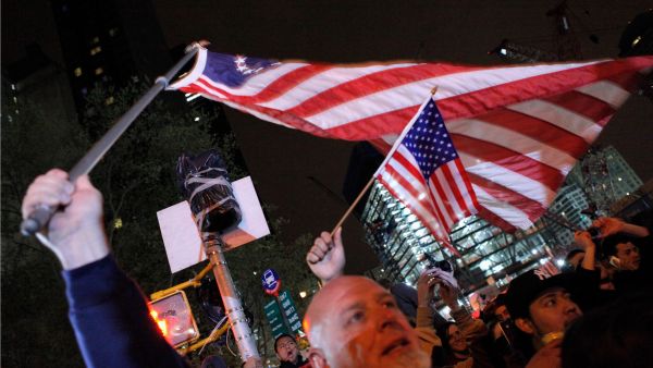 American's show little decorum as they celebrate death at the site of a mass grave of sorts at Ground Zero