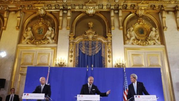 US Secretary of State John Kerry (R) and British Foreign Secretary William Hague (L) listen on September 16, 2013 to French Foreign Minister Laurent Fabius (C) during a press conference at the Foreign Ministry in Paris following their meeting on the Syria crisis. (AFP)  US Secretary of State John Kerry (R) and British Foreign Secretary William Hague (L) listen on September 16, 2013 to French Foreign Minister Laurent Fabius (C) during a press conference at the Foreign Ministry in Paris following their meeting on the Syria crisis. (AFP)