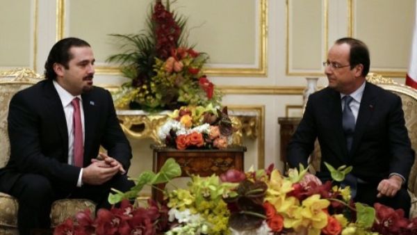 Suleiman's announcement of Saudi's $3 billion grant for the Lebanese army coincided with Saad Hariri's meeting with French President Francois Hollande Sunday in Saudi Arabia (Kenzo Triboillard/AFP)