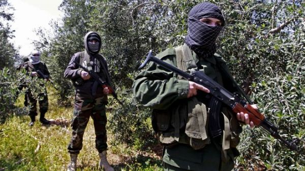 Hezbollah fighters in Syria supported Syrian regime attacks in Damascus (Associated Press)
