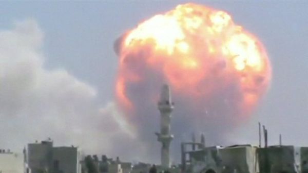 An explosion from the arms depot near Homs killed dozens earlier this year (Courtesy of BBC)