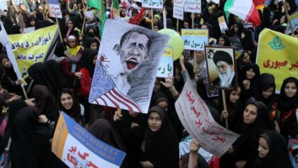 آلاف الايرانيين يهتفون في طهران الموت لاميركا 