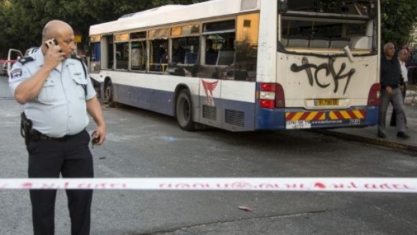 Monday's rocket follows Sunday's bomb attack on a bus in central Israel (Jack Guez/AFP)