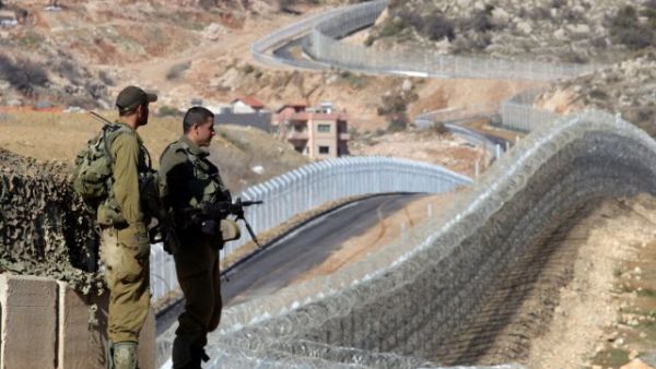 Israel has placed humanitarian aid near border areas where Syrians in need have easy access to retrieve the aid (Courtesy of Yaron Kaminsky/Haaretz)