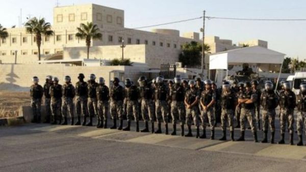Jordanian riot police ready for a night of battle in Amman.