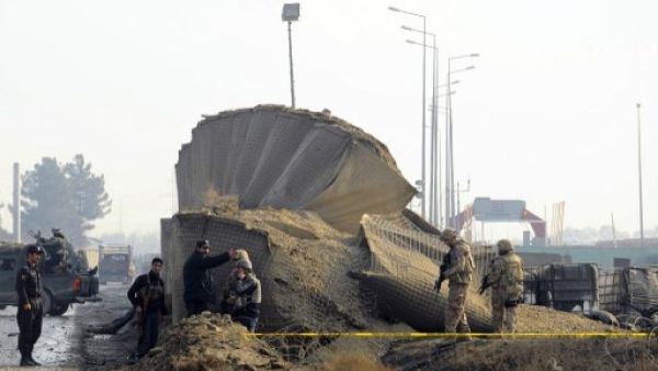 Soldiers guard the site where a Taliban suicide bomber detonated a car bomb earlier this week near the Kabul airport (Aref Karimi/AFP)