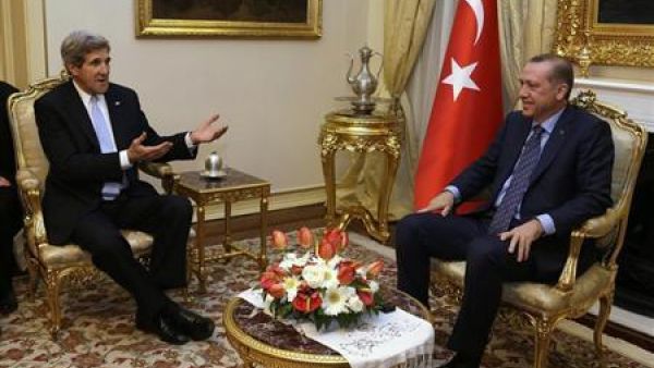 Secretary of State John Kerry sits with Turkish President Tayyip Erdogan.