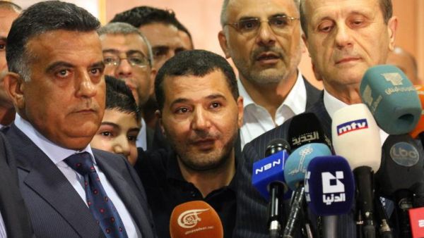 Major General Abbas (L) brokered the deal to release the nine Lebanese captives with Syrian rebels in Damascus Friday (AFP)