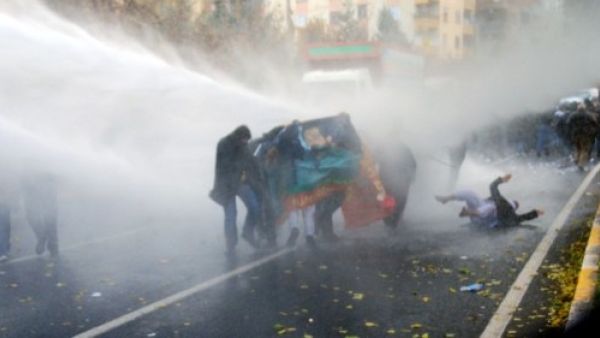 Turkish police used water cannons and tear gas to break up a Kurdish protest in Yuksekova, leaving two people dead. (Mehmet Engin/AFP)