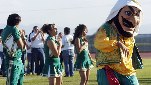 The American-Arab Anti-Discrimination Committee (ADC) called on the school earlier this year to change its mascot, citing its large nose, heavy beard, and kaffiyeh garments as perpetuating stereotypes of Arabs and Arab Americans (Marilyn Chung/AP)