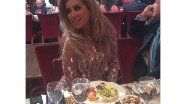 Maya Diab loves to pose even at dinner time! (Image: Facebook)