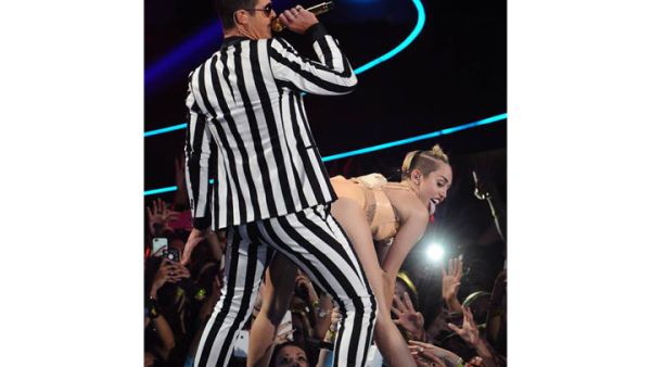 Miley Cyrus shocked celebs and viewers alike with her trashy fashion choices and un-ladylike behavior. (Image: Facebook)