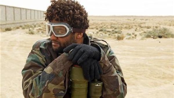 مقاتل من المعارضة في اجدابيا يوم الثلاثاء
