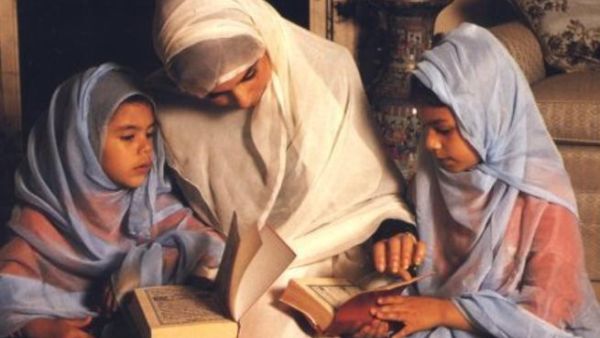 Muslim families reading and reciting the holy Quran