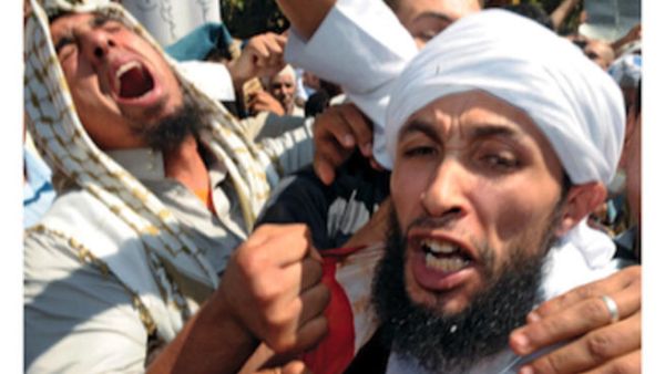 Find a guy with a beard and a turban, take a photo of him mid-scream and wa-la!  A cover photo is born!