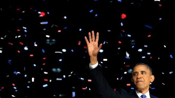 Obama takes the victor's spoils in 2012's historic election