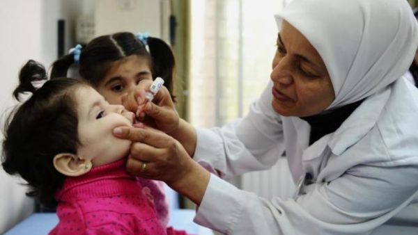 WHO launched a polio vaccination campaign earlier this month in Syria and neighboring countries in an effort to curb the spread of the paralyzing disease (AP)