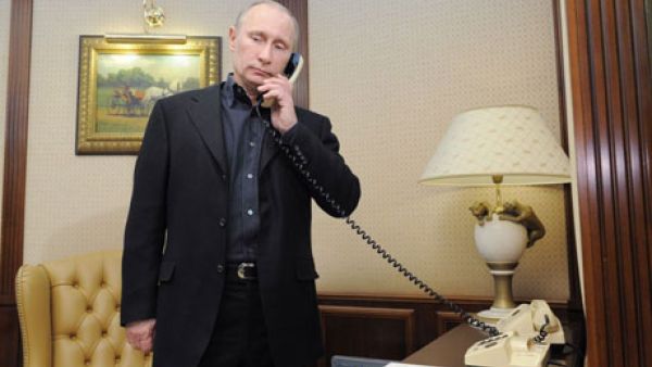 Russian president Vladimir Putin telephoned Iran's president Hassan Rouhani Monday two days ahead of talks in Geneva on Tehran's nuclear program (AFP/Getty Images)