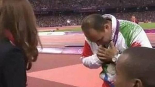 Mehrdad Karam Zadeh bowed his head rather than have contact with an unrelated woman (source: Press TV)
