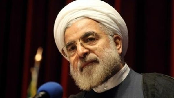 Iranian President Hassan Rouhani has implied that if the West lifts all sanctions on the Islamic Republic, Iran will shut down one of its nuclear facilities. (AFP/File)